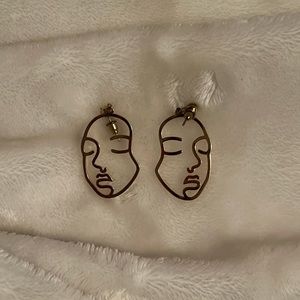 minimalistic face gold earrings